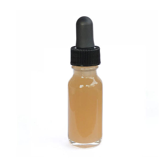 15 ml Katukina Sananga eye-drop bottle: clear glass filled with amber-colored liquid and topped with a black rubber dropper
