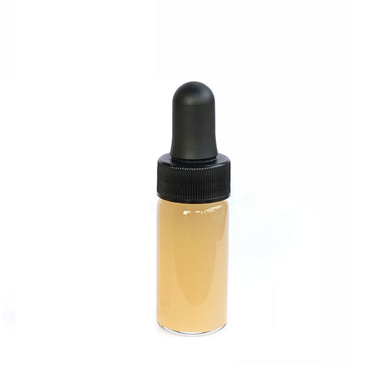 9 ml Kuntanawa Sananga eye-drop bottle: clear glass filled with amber-colored liquid and topped with a black rubber dropper