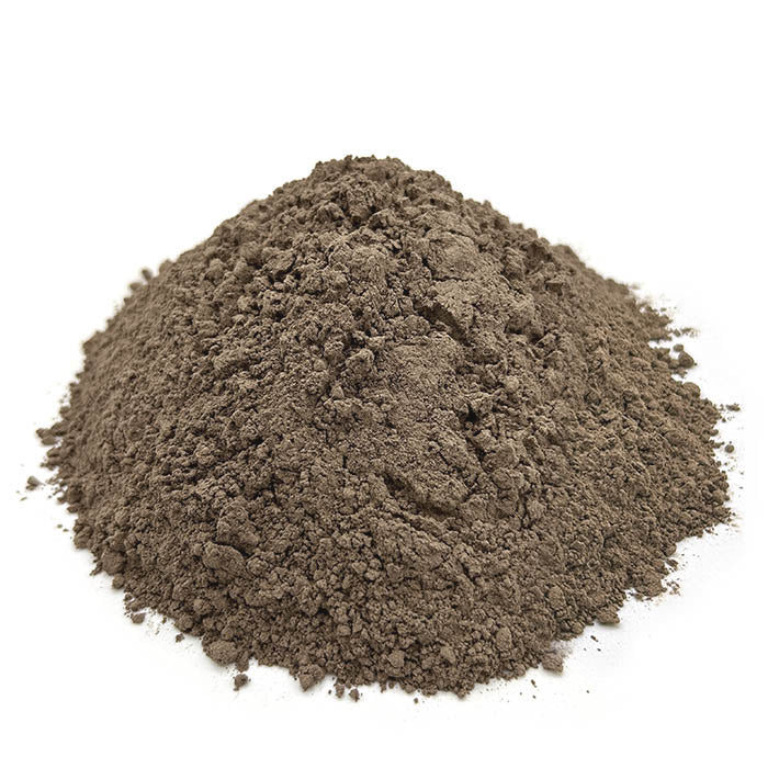 A mound of Tsunu Six Herbs rapé (hapé) snuff powder from the Katukina tribe of Acre, Brazil