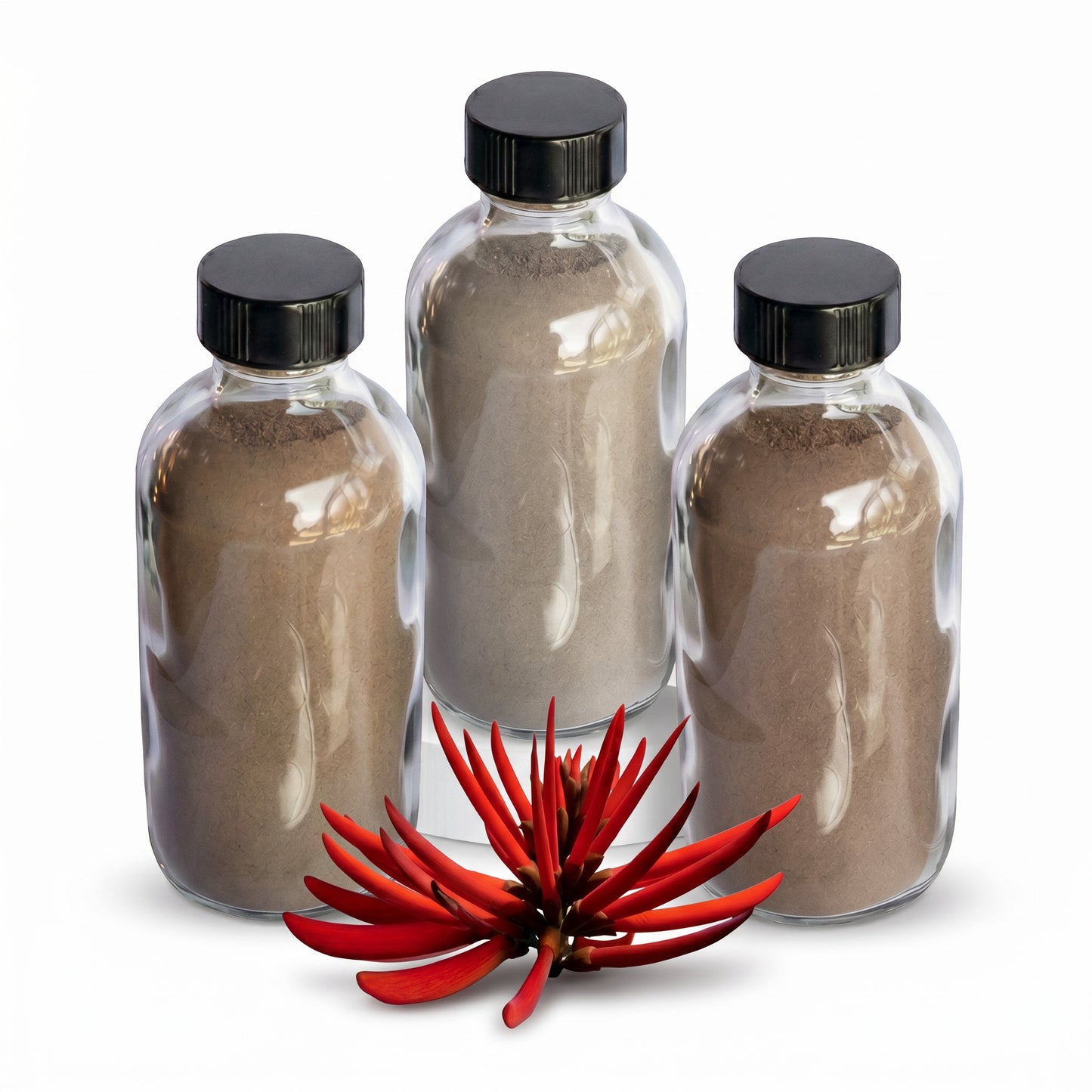 Strength & Stillness hapé bundle — Mulungu, Samauma Root and Seven Herbs rapé bottles with a scarlet Mulungu flower