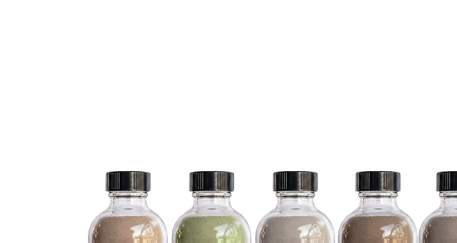 Four hapé blends in glass bottles