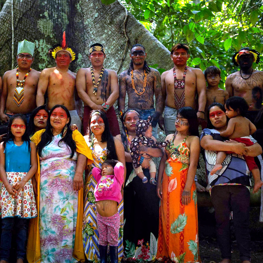 The Yawanawá community together — all ages, in traditional dress
