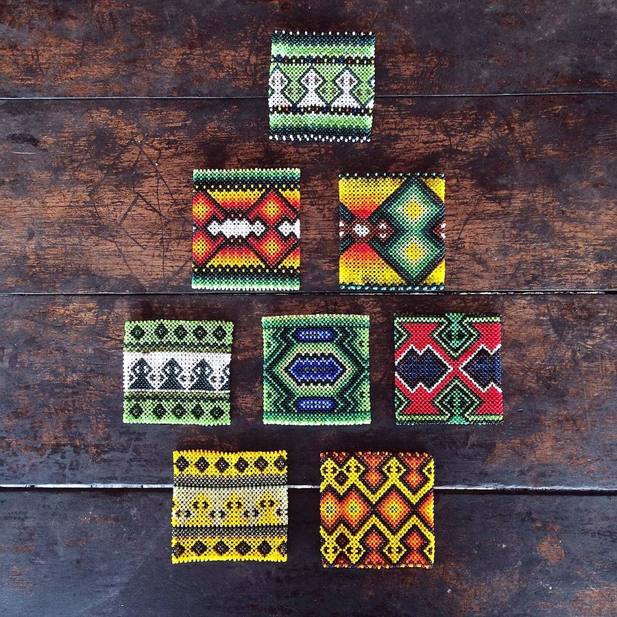 Beadwork wristbands handmade by Yawanawá women, in vibrant Amazonian patterns
